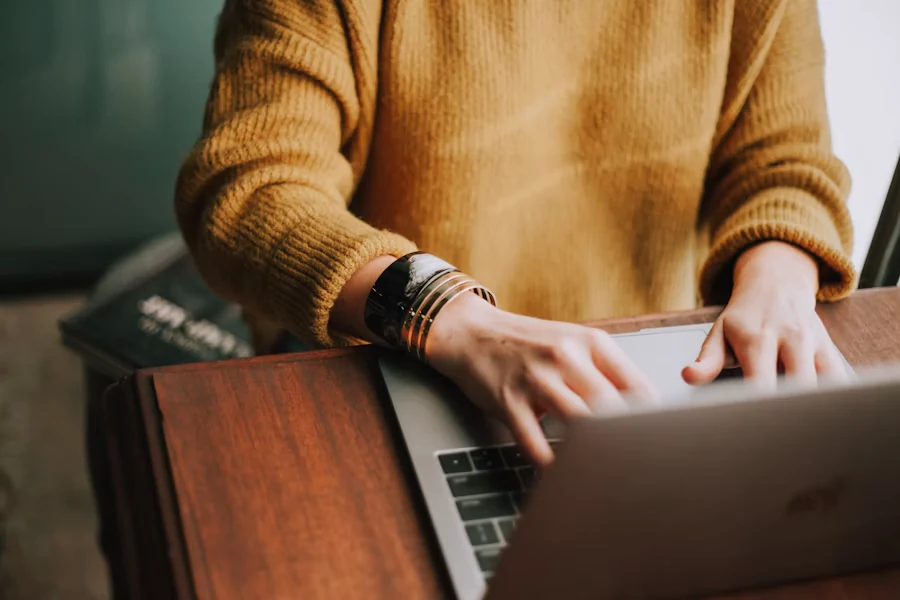 Creator working on a laptop at a desk